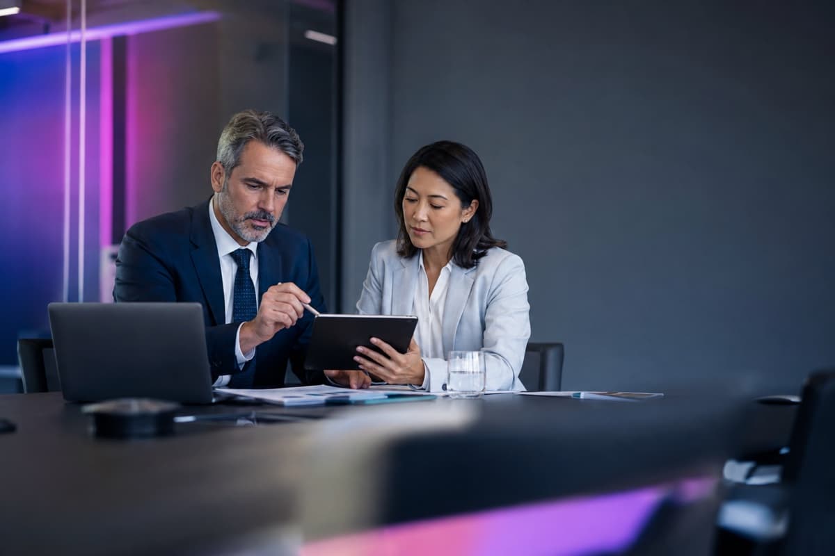 Operations and finance leaders conducting a controlled digital approval review